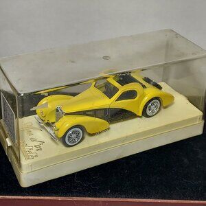 BUGATTI 57 S ATALANTE 1939 Yellow Diecast made in France by SOLIDO, scale 1/43